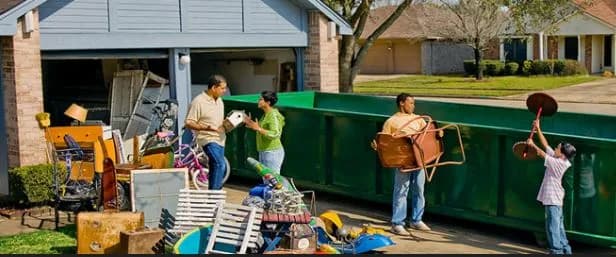 Curbside roll-off dumpster during a large multi-room home cleanout